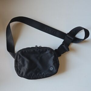 Lolë Black Crossbody Bag